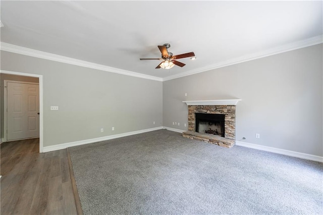 unfurnished living room featuring ornamental molding, a ceiling fan, and baseboards