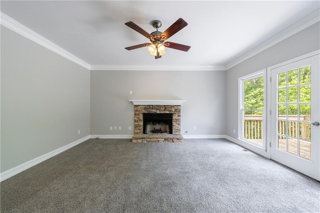 unfurnished living room featuring baseboards, carpet flooring, and crown molding