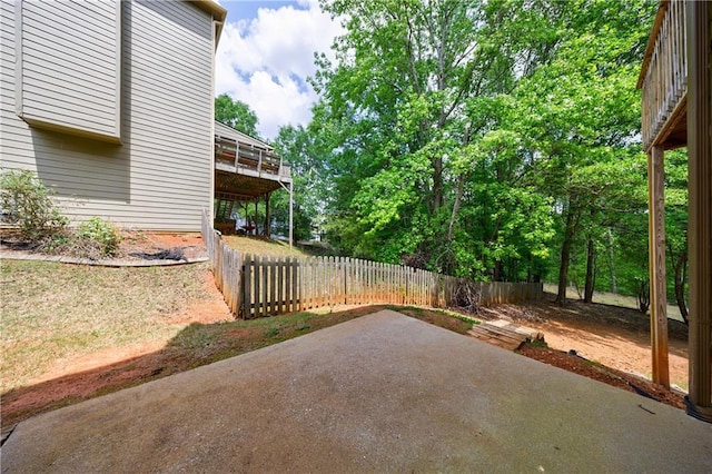 view of patio / terrace with fence and a wooden deck