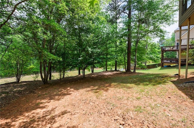 view of yard with a deck
