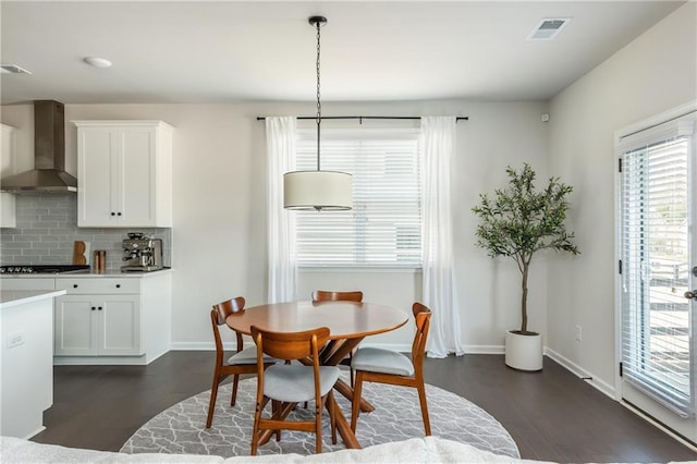 5025 Bryce Ln, Cumming, GA 30040 - dining room with dark wood finished floors and baseboards