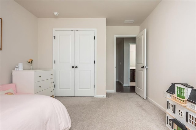 5025 Bryce Ln, Cumming, GA 30040 - carpeted bedroom with baseboards and a closet
