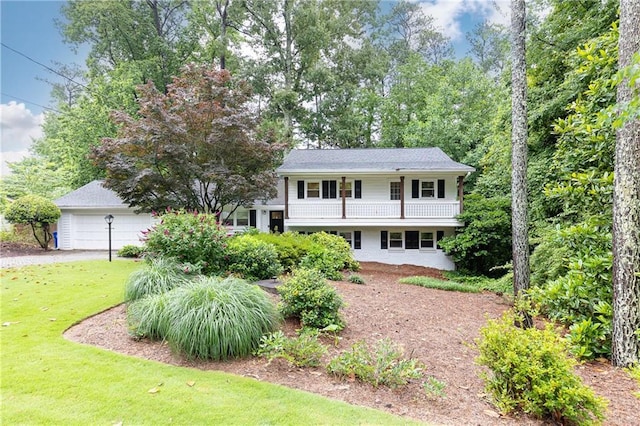 1329 W Nancy Creek Dr NE, Brookhaven, GA 30319 - split level home with a front lawn and a balcony