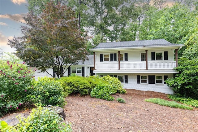1329 W Nancy Creek Dr NE, Brookhaven, GA 30319 - tri-level home featuring brick siding and a balcony