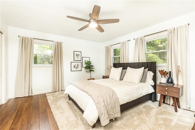 1329 W Nancy Creek Dr NE, Brookhaven, GA 30319 - bedroom featuring multiple windows, hardwood / wood-style floors, ceiling fan, and baseboards