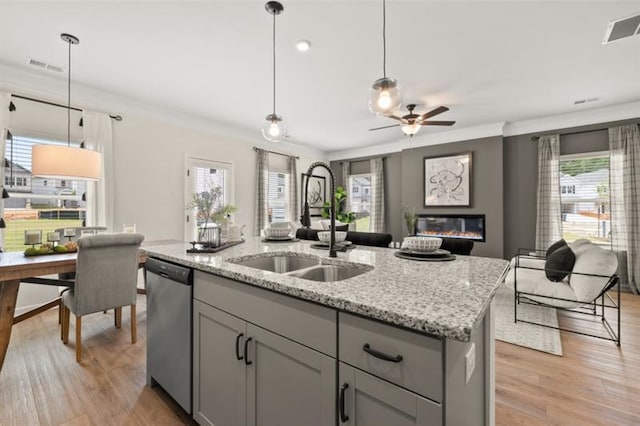 2450 Ravencliff Dr Unit 146, Austell, GA 30168 - kitchen with stainless steel dishwasher, gray cabinetry, a sink, a ceiling fan, and open floor plan
