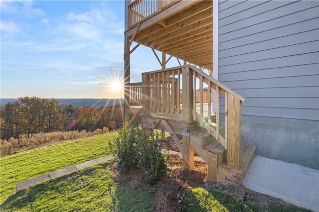 wooden deck with a yard