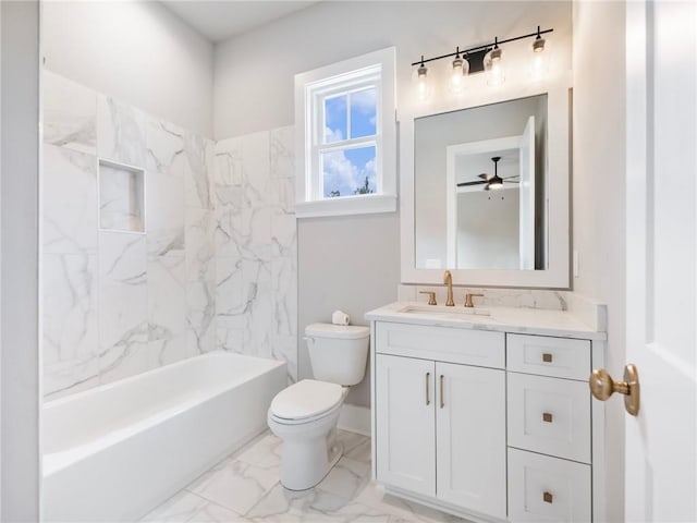 full bathroom with tiled shower / bath combo, vanity, and toilet