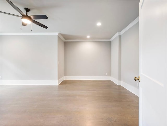 empty room featuring crown molding and ceiling fan