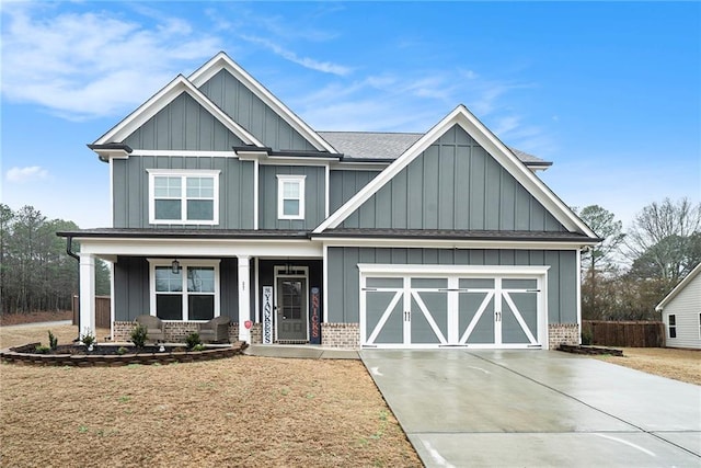 craftsman-style house with a porch and a garage