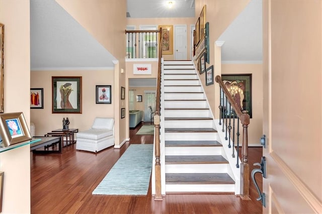 3573 Willow Tree Trce, Decatur, GA 30034 - staircase with wood finished floors, ornamental molding, baseboards, and a towering ceiling