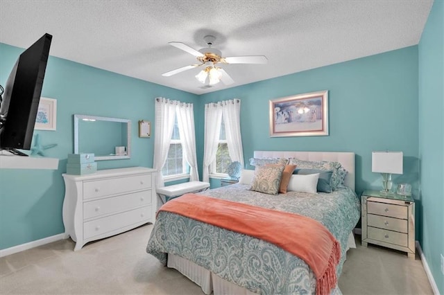 3573 Willow Tree Trce, Decatur, GA 30034 - carpeted bedroom with a textured ceiling, baseboards, and a ceiling fan