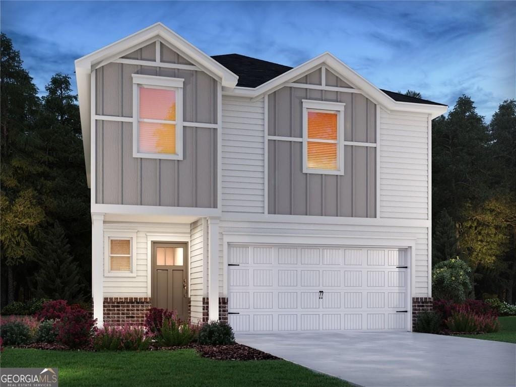 view of front facade featuring concrete driveway, brick siding, board and batten siding, and an attached garage