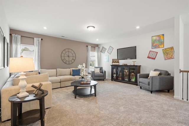 living room featuring light colored carpet