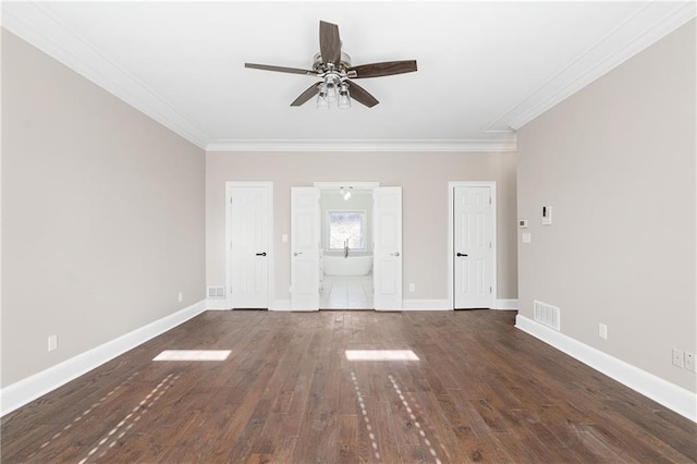 interior space with crown molding, dark hardwood / wood-style floors, and ceiling fan