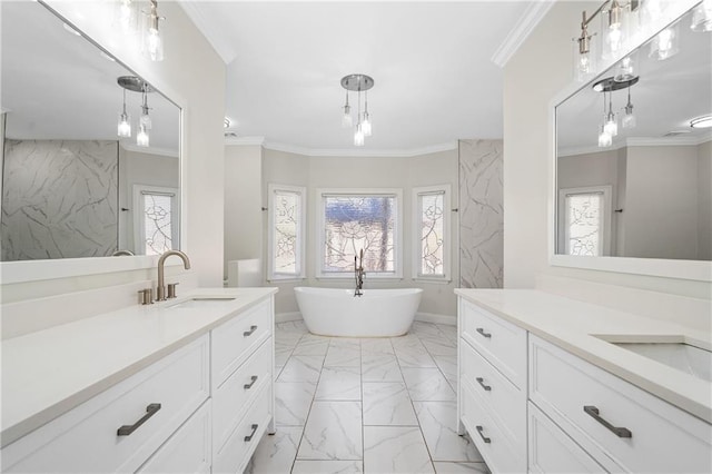 bathroom with vanity, a bath, and ornamental molding