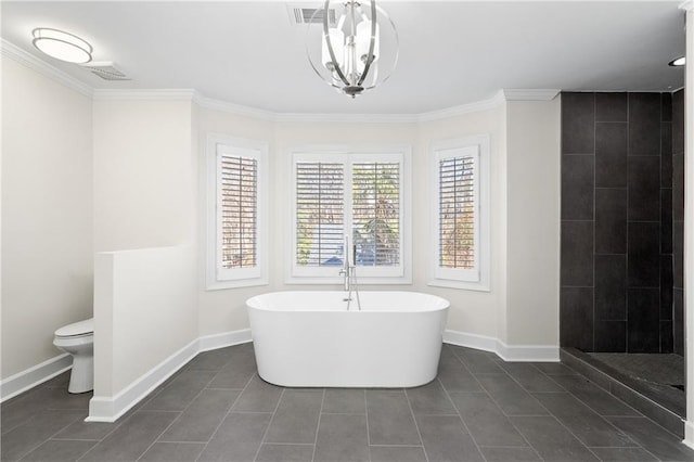 bathroom with tile patterned flooring, ornamental molding, plus walk in shower, toilet, and a chandelier