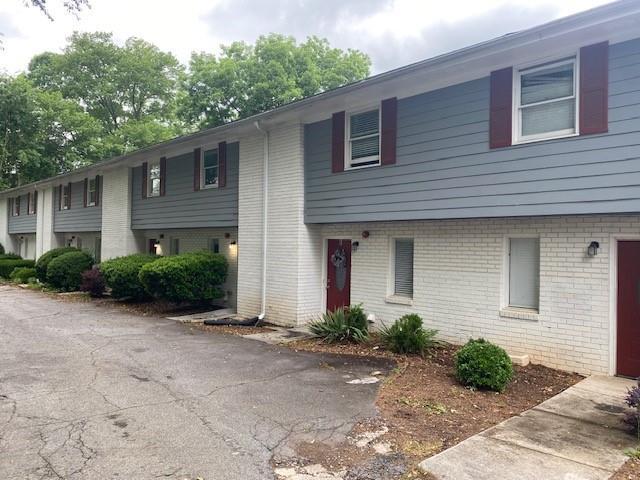 3241 Turner St, East Point, GA 30344 - townhome / multi-family property featuring brick siding