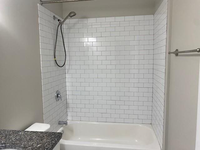3241 Turner St, East Point, GA 30344 - bathroom featuring vanity, washtub / shower combination, and toilet