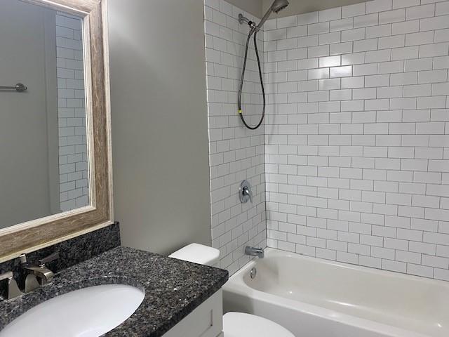 3241 Turner St, East Point, GA 30344 - bathroom with vanity, toilet, and shower / tub combination