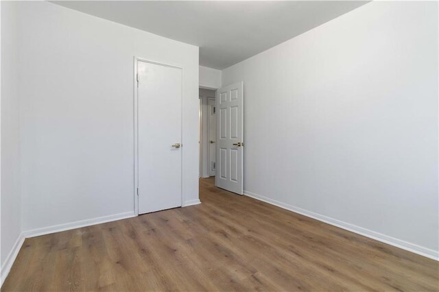 1894 Evans Dr SW, Atlanta, GA 30310 - unfurnished room featuring wood finished floors and baseboards