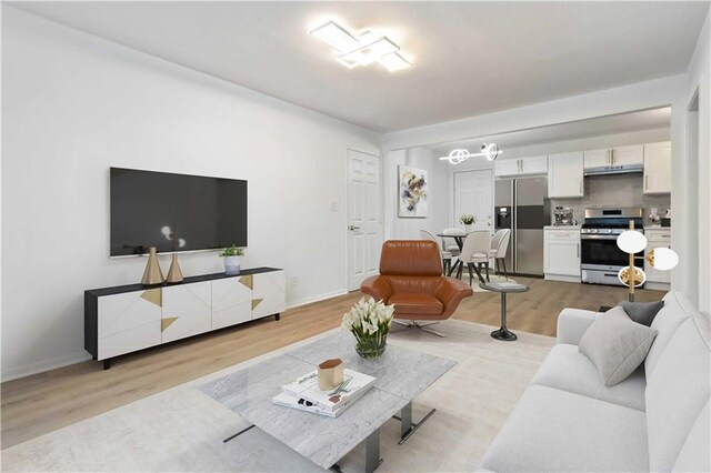 1894 Evans Dr SW, Atlanta, GA 30310 - living area with baseboards and light wood finished floors