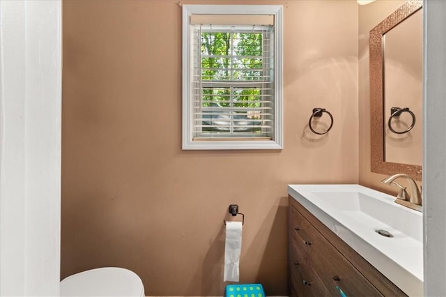 858 Red Rock Ct, Suwanee, GA 30024 - half bath with vanity and toilet