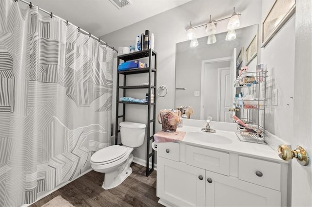 858 Red Rock Ct, Suwanee, GA 30024 - full bath featuring wood finished floors, vanity, and a shower with curtain