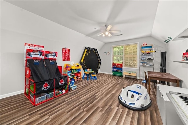 858 Red Rock Ct, Suwanee, GA 30024 - playroom with wood finished floors, a ceiling fan, and vaulted ceiling