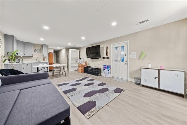858 Red Rock Ct, Suwanee, GA 30024 - living area with light wood-type flooring and recessed lighting
