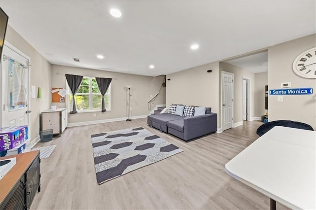 858 Red Rock Ct, Suwanee, GA 30024 - living area with wood finished floors, recessed lighting, and stairs
