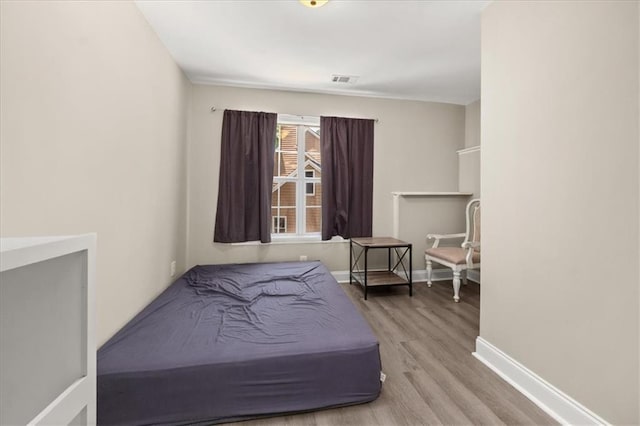 858 Red Rock Ct, Suwanee, GA 30024 - bedroom with wood finished floors and baseboards
