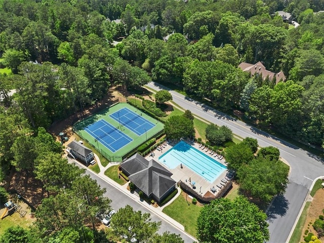 858 Red Rock Ct, Suwanee, GA 30024 - aerial view of a forest and a pool