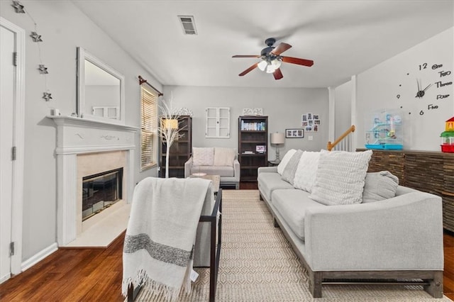 858 Red Rock Ct, Suwanee, GA 30024 - living area featuring ceiling fan, wood finished floors, and a fireplace