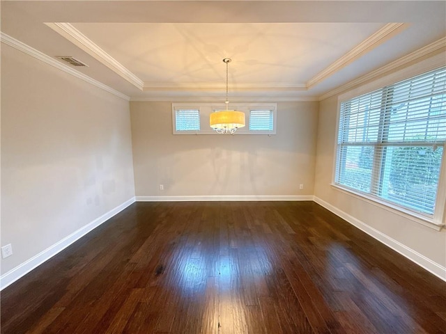 unfurnished dining area with dark wood-style floors, visible vents, baseboards, and crown molding