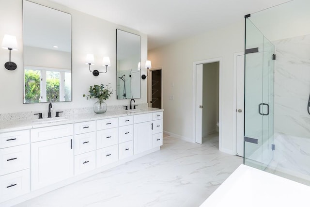 bathroom featuring tile floors, double sink, oversized vanity, and a shower with door