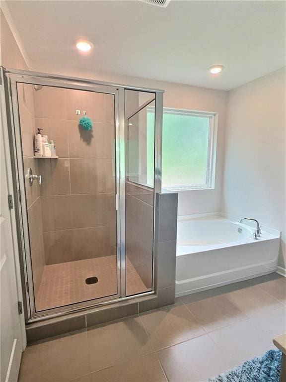 283 Wells Cir, Canton, GA 30114 - full bath featuring a bath, a stall shower, tile patterned flooring, and recessed lighting