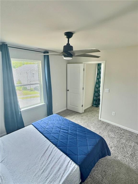 283 Wells Cir, Canton, GA 30114 - carpeted bedroom with baseboards