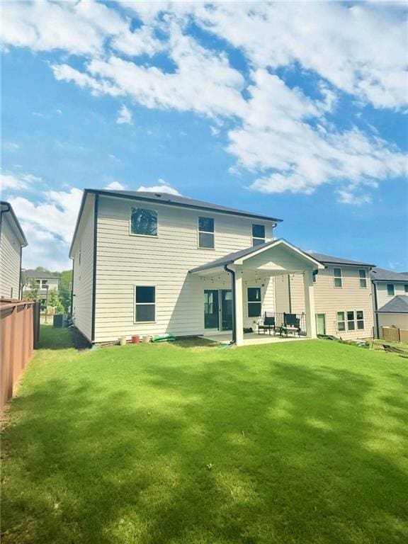 283 Wells Cir, Canton, GA 30114 - back of property with a patio