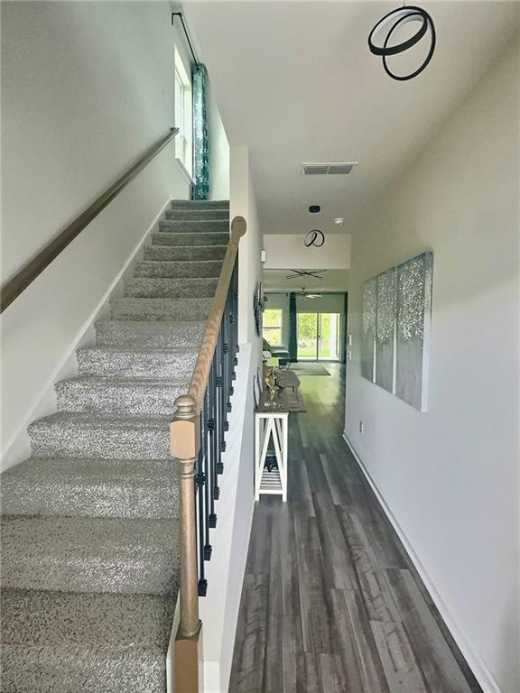 283 Wells Cir, Canton, GA 30114 - stairway with wood finished floors