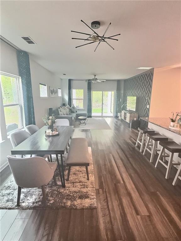 283 Wells Cir, Canton, GA 30114 - dining space featuring wood finished floors, plenty of natural light, and ceiling fan