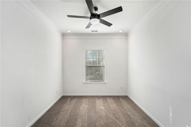 unfurnished bedroom featuring light colored carpet, ceiling fan, and crown molding