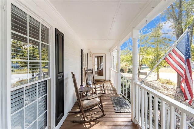 balcony featuring covered porch