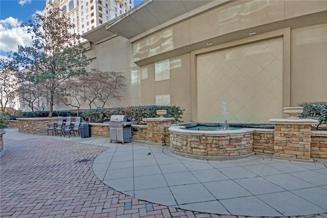 view of patio / terrace with a grill