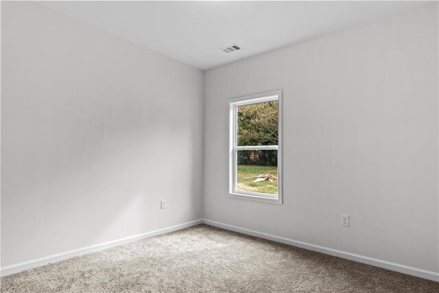 view of carpeted spare room