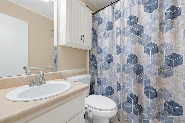 bathroom featuring toilet, vanity, ornamental molding, and a shower with curtain
