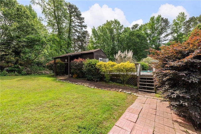 view of yard with stairway and a wooden deck