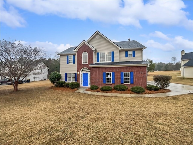 view of front of home with a front yard