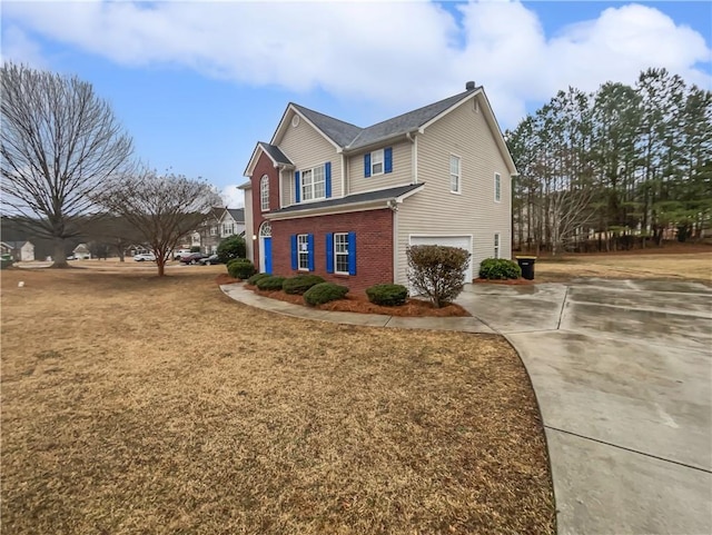 view of side of home featuring a garage and a lawn