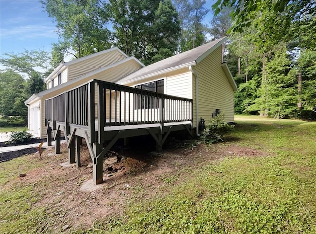2140 Fern Valley Dr SW, Atlanta, GA 30331 - view of property exterior with a wooden deck and a lawn